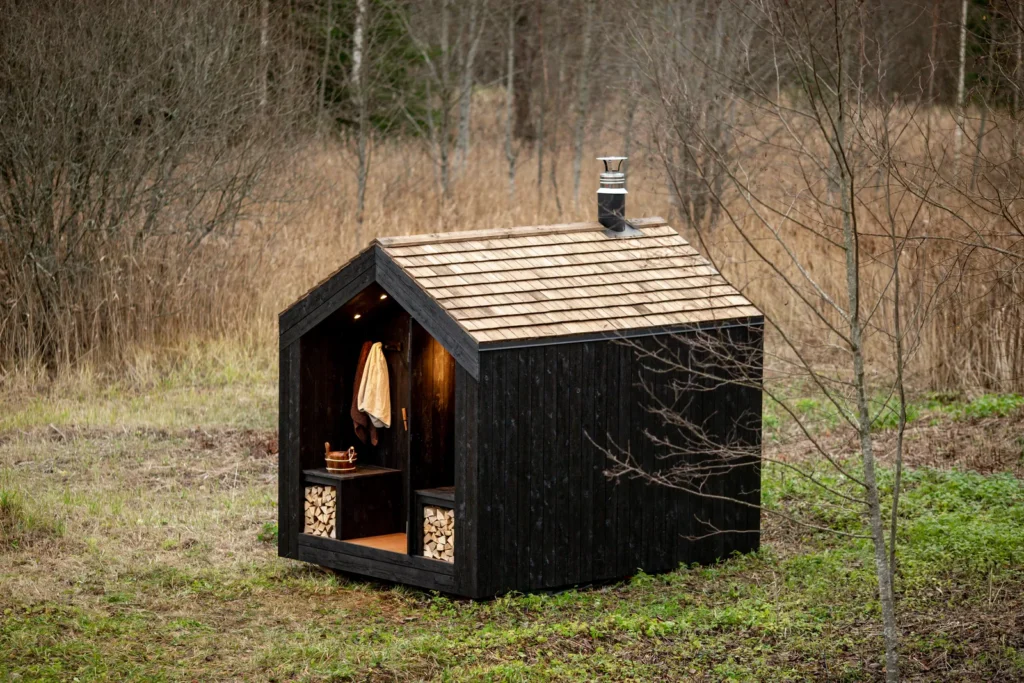 BARN Nordic buitensauna van SaunaLAB met verlichte veranda